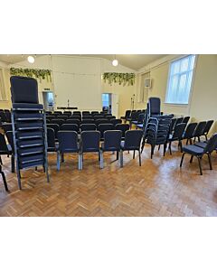 Profile view of Supremo Steel Stacking Chair