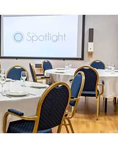 Profile view of Round Back Aluminium Banqueting Chair with Arms in Blue Fabric