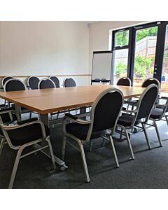 Profile view of Round Back Aluminium Banqueting Chair with Arms in Black Fabric