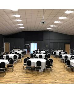 Profile view of Round Back Aluminium Banqueting Chair in Black Fabric