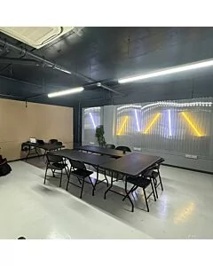 Profile view of Black Apollo Plastic Folding Chair