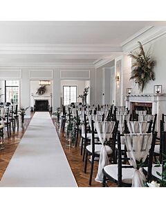 Profile view of Black Chiavari Banqueting Chair with White Vinyl Seat Pad