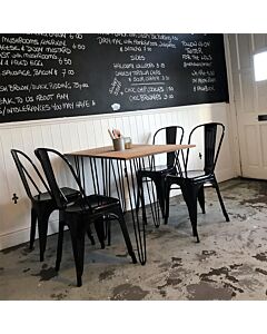 Profile view of Gloss Black Tolix Side Chair