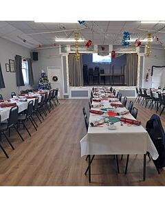 Profile view of Economy Steel Banqueting Chair in Black Vinyl Fabric