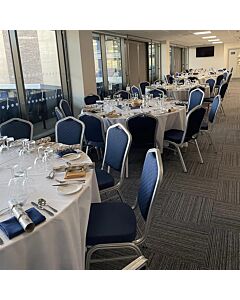 Profile view of Diamond Aluminium Banqueting Chair in Blue Fabric