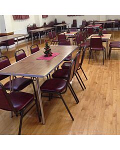 Profile view of Economy Steel Banqueting Chair in Burgundy Vinyl Fabric
