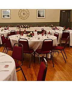 Profile view of Economy Steel Banqueting Chair in Burgundy Fabric