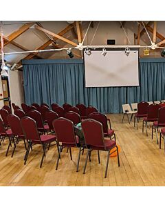 Profile view of Diamond Steel Banqueting Chair in Burgundy Fabric