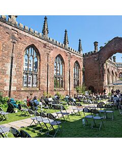 Profile view of Charcoal Economy Fanback Plastic Folding Chair