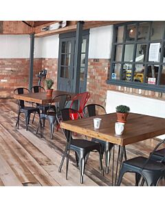 Profile view of Gun Metal Grey Tolix Side Chair