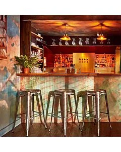Profile view of Industrial Grey Tolix Bar Height Stool