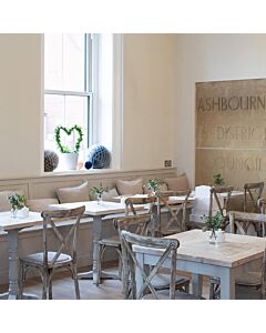 Profile view of Oak Frame Limewash Finish Crossback Banqueting Chair with Rattan Pad