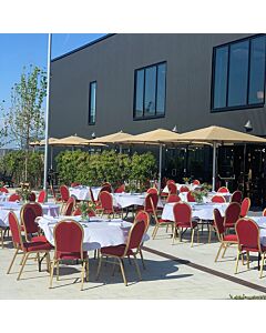 Profile view of Round Back Aluminium Banqueting Chair in Red Fabric