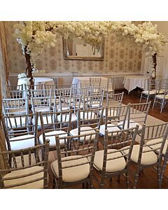 Profile view of Silver Chiavari Banqueting Chair with Blue Seat Pad