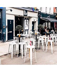 Profile view of White Tolix Bar Height Stool