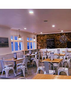 Profile view of White Tolix Side Chair