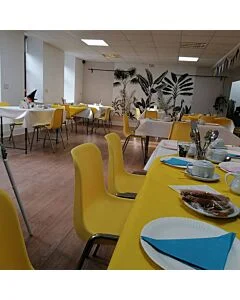 Yellow economy plastic stacking chair