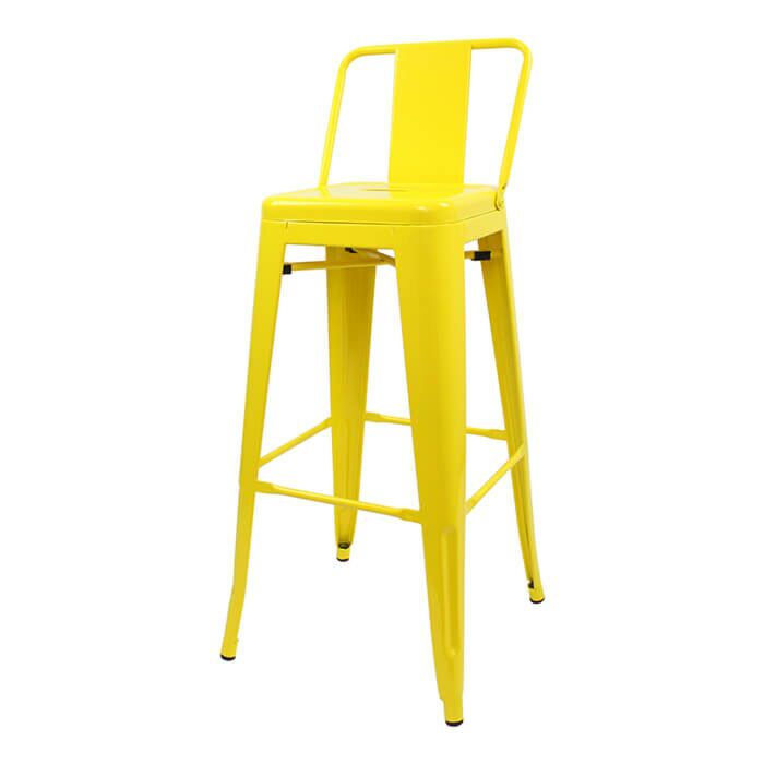 Profile view of Yellow Tolix Bar Height Stool Low Back