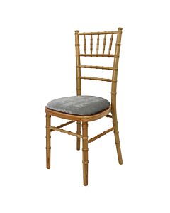 Profile view of Natural Chiavari Banqueting Chair with Light Grey Seat Pad