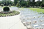 stacking wedding chairs at uk garden venue