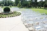 stacking wedding chairs at uk garden venue